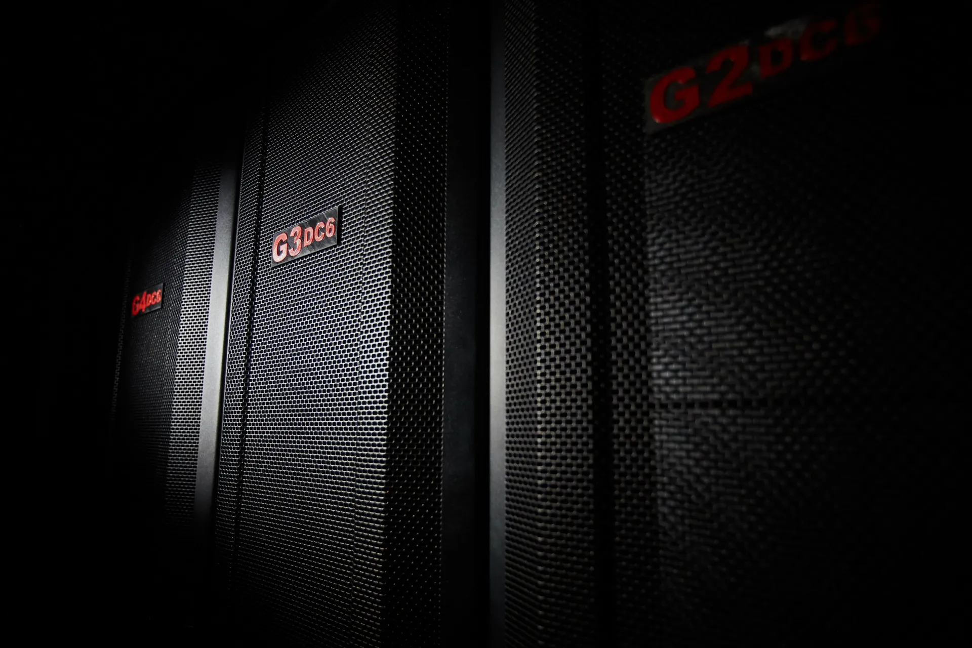 DC6 rack doors with red G3 and G2 DC6 labels, a real photo.